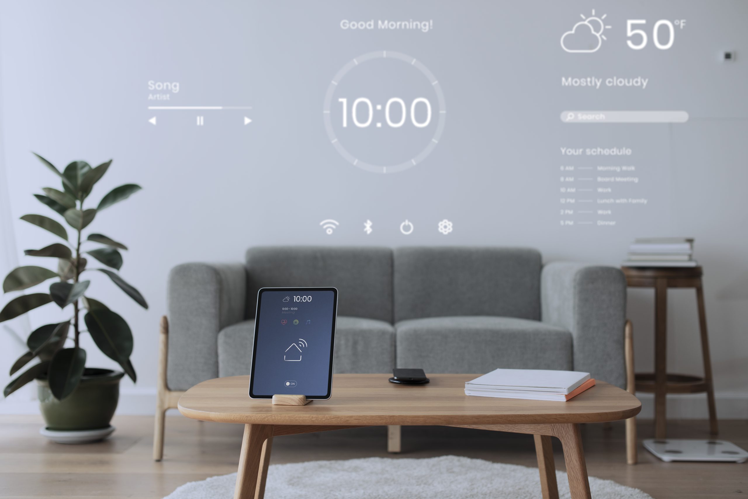 Digital tablet screen with smart home controller on a wooden tab
